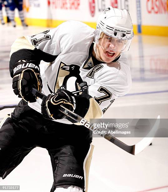 Evgeni Malkin of the Pittsburgh Penguins shoots during warmup before taking on the Toronto Maple Leafs during a NHL game at the Air Canada Centre on...