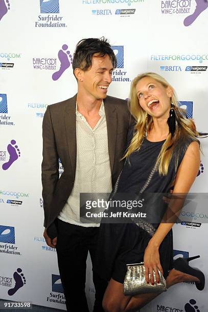 Brandon Boyd and Carolyn Murphy attends The Surfrider Foundation's 25th Anniversary Gala at the California Science Center's Wallis Annenberg Building...