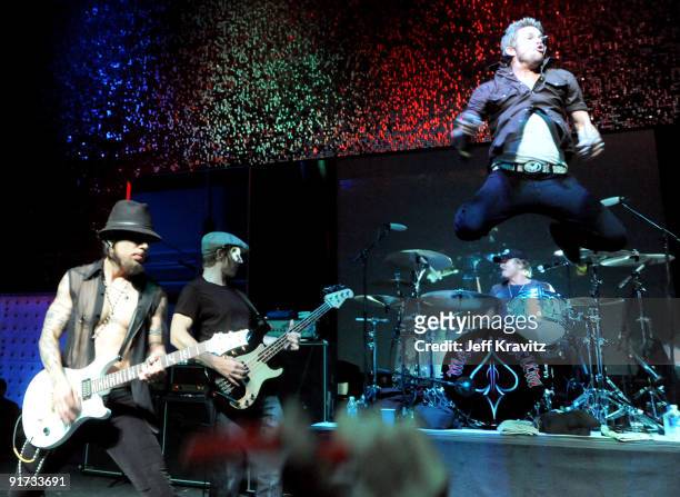 Dave Navarro, Chris Chaney, Matt Sorum and Mark McGrath performs at The Surfrider Foundation's 25th Anniversary Gala at the California Science...