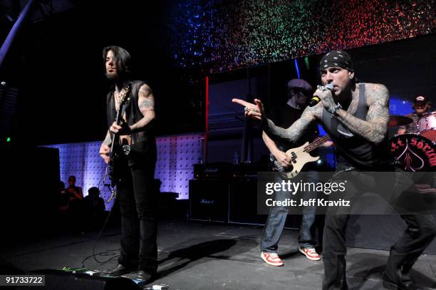 Dave Navarro, Chris Chaney and Evan Seinfeld performs at The Surfrider Foundation's 25th Anniversary Gala at the California Science Center's Wallis...