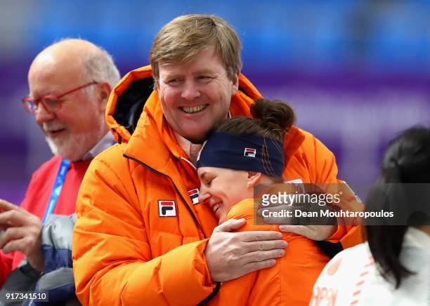 King Willem-Alexander of the Netherlands speaks to gold medal winner Ireen Wust of The Netherlands after the Ladies 1,500m Long Track Speed Skating...