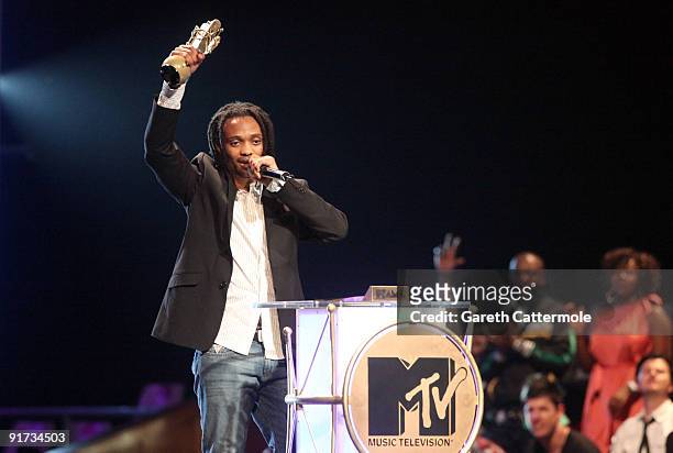 Thokozani Dube accepts the Legend Award won by his late father Lucky Dube at the MTV Africa Music Awards with Zain at the Moi International Sports...