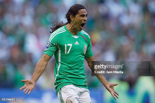 Francisco Palencia of Mexico celebrates scored goal during their 2010 FIFA World Cup qualifying soccer match between Mexico and El Salvador at the...