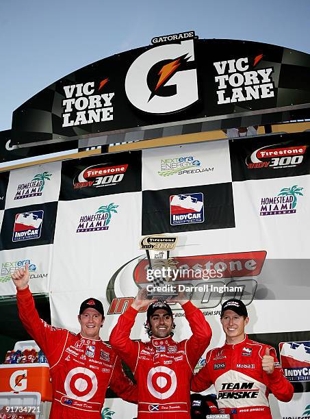 Dario Franchitti, driver of the Target Chip Ganassi Racing Dallara Honda celebrates winning the the IRL IndyCar Series Firestone Indy 300 with second...