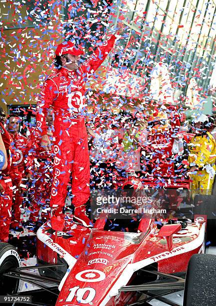 Dario Franchitti, driver of the Target Chip Ganassi Racing Dallara Honda celebrates winning the the IRL IndyCar Series Firestone Indy 300 on October...