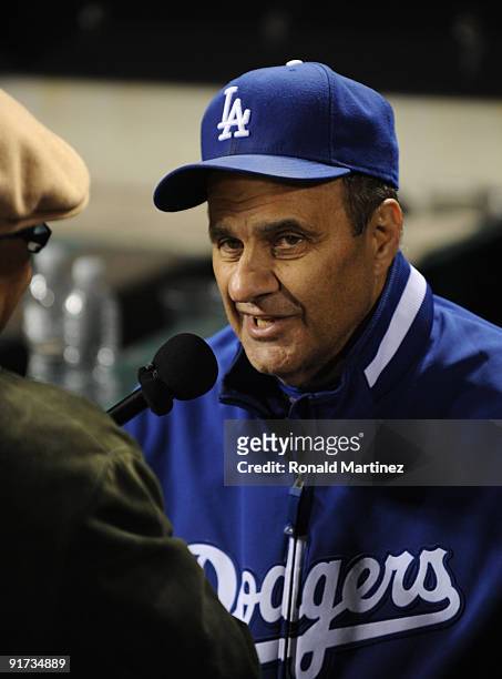 Manager Joe Torre of the Los Angeles Dodgers is interviewed after his teams 5-1 victory of Game Three to win the NLDS after sweeping the St. Louis...
