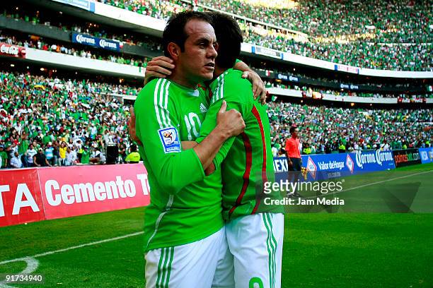 Cuauhtemoc Blanco and Guillermo Franco of Mexico celebrate scored goal during their FIFA 2010 World Cup Qualifying match at the Azteca Stadium on...