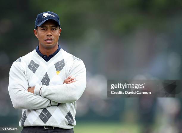 Tiger Woods of the USA plays his second shot at the 8th hole during the Day Three Afternoon Fourball Matches in The Presidents Cup at Harding Park...