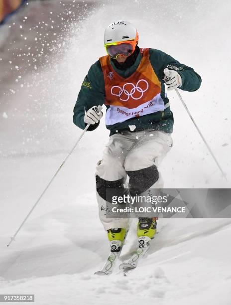 Australia's Matt Graham competes to place second of the men's moguls final during the Pyeongchang 2018 Winter Olympic Games at the Phoenix Park in...