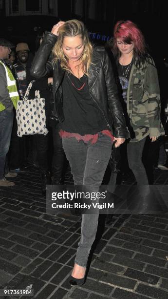 Kate Moss and Kelly Osbourne at The Box Club on November 24, 2011 in London, England.