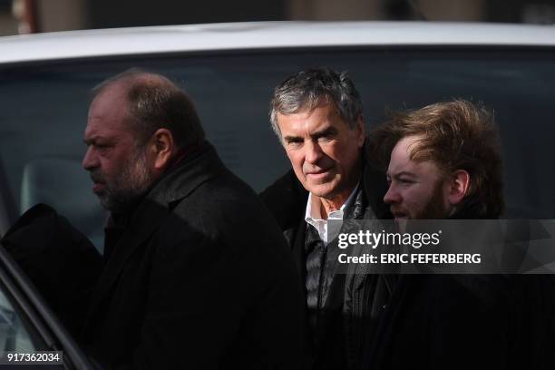 French former budget minister Jerome Cahuzac and his lawyer Eric Dupond-Moretti leave the Paris courthouse during his appeal trial on tax fraud and...