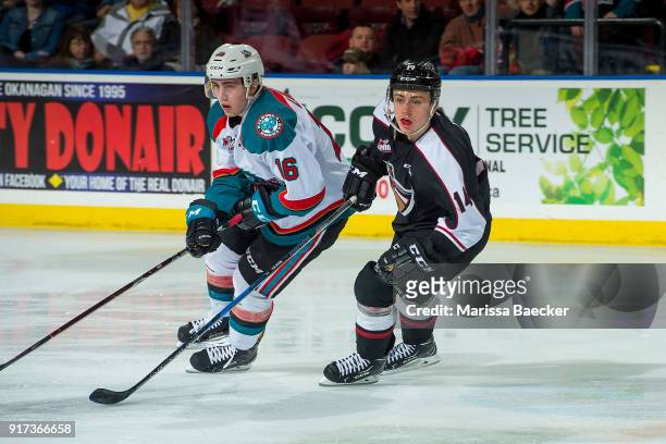 James Malm of the Vancouver Giants checks Kole Lind of the Kelowna Rockets at Prospera Place on February 7, 2018 in Kelowna, Canada.