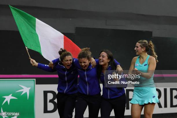 The Italy team celebrate the victory of 2018 Fed Cup BNP Paribas World Group II First Round match between Italy and Spain at Pala Tricalle...