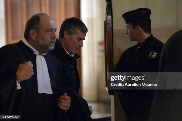 Former French Minister of Economy, Jerome Cahuzac leaves the court house after his appeal trial with his lawyer Eric Dupond-Moretti on February 12,...