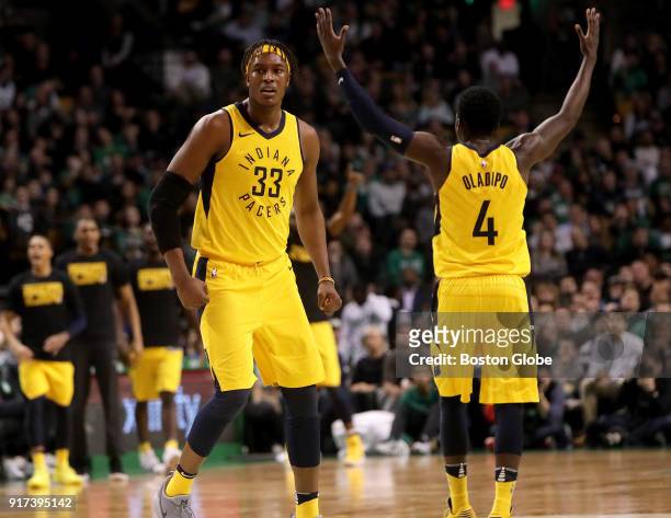 Indiana Pacers center Myles Turner and Indiana Pacers guard Victor Oladipo celebrated after Turner got the basket and a trip to the charity stripe...