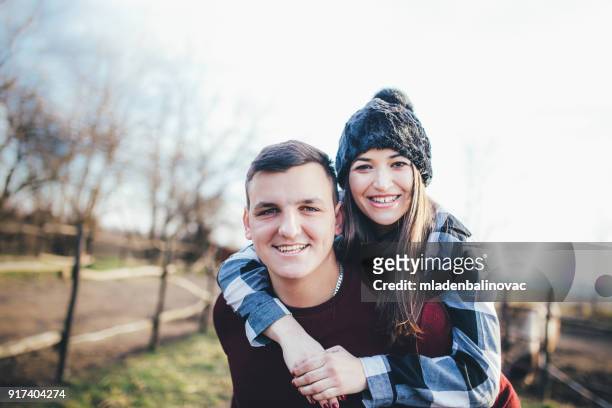 ungt par firar alla hjärtans dag på gården - european best pictures of the day february 14 2018 bildbanksfoton och bilder