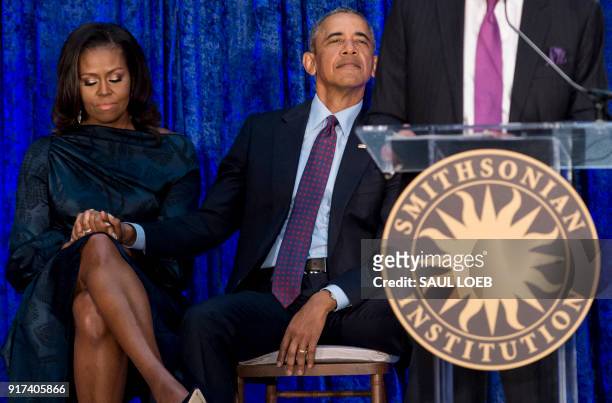 Former US President Barack Obama and former US First Lady Michelle Obama attend the unveiling of their portraits at the Smithsonian's National...