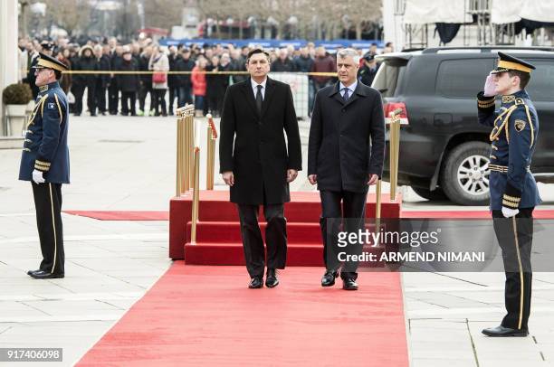 Kosovo President Hashim Thaci flanked by his Slovenian counterpart Borut Pahor review Kosovo's Security Force honor guard during a welcoming ceremony...