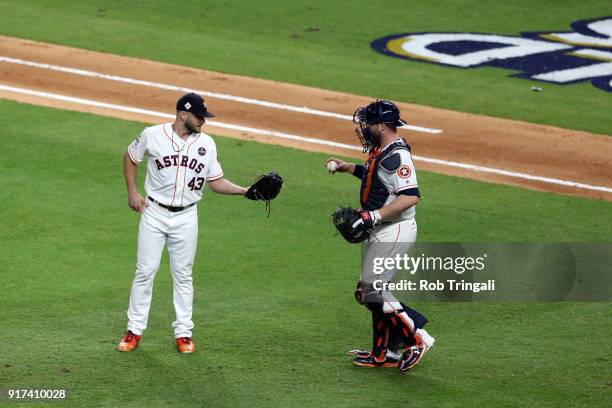 Lance McCullers Jr. #43 and Brian McCann of the Houston Astros meet in front of the mound during Game 3 of the 2017 World Series against the Los...