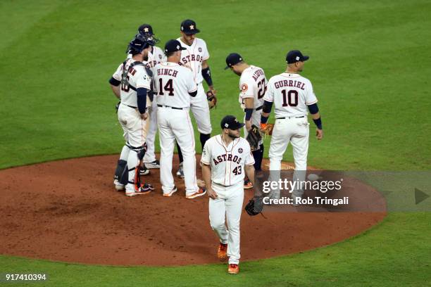 Manager A.J. Hinch of the Houston Astros makes a pitching change during Game 3 of the 2017 World Series against the Los Angeles Dodgers at Minute...