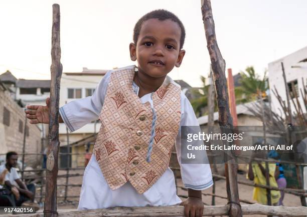 Sunni muslim boy dressed for the Maulidi festivities, Lamu County, Lamu Town, Kenya on January 1, 2012 in Lamu Town, Kenya.