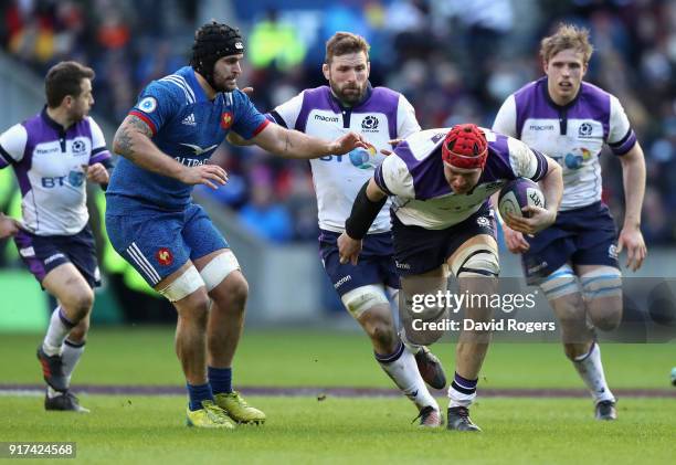 Grant Gilchrist of Scotland charges upfield during the Six Nations match between Scotland and France at Murrayfield on February 11, 2018 in...