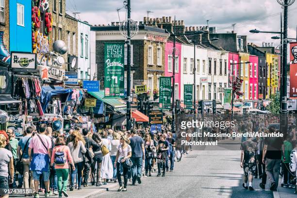 camden town, people and typical shops in camden high street - crowded stock pictures, royalty-free photos & images