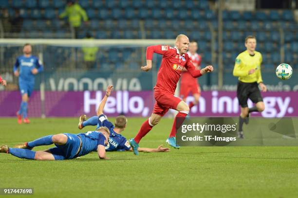 Philipp Ochs of Bochum, Johannes Wurtz of Bochum and Gerrit Nauber of Duisburg battle for the ball during the second Bundesliga match between VfL...