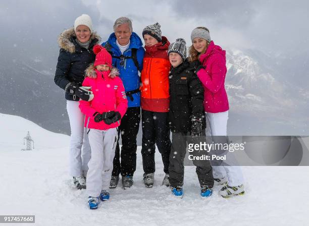 Queen Mathilde of Belgium, Princess Eleonore, King Philippe of Belgium, Prince Gabriel, Prince Emmanuel and Princess Elisabeth pose during their ski...
