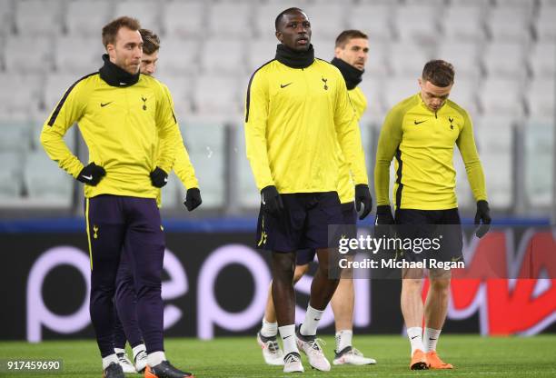 Christian Eriksen of Tottenham Hotspur and Moussa Sissoko of Tottenham Hotspur look on during the Tottenham Hotspur FC Training Session ahead of...