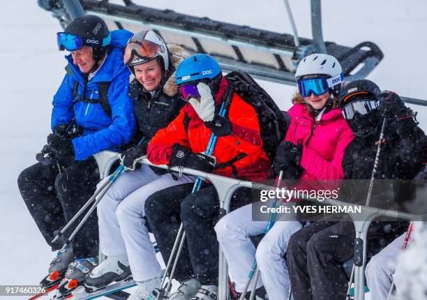 King Philippe of Belgium, Queen Mathilde of Belgium, Prince Gabriel, Crown Princess Elisabeth, Prince Emmanuel and Princess Eleonore wave from a ski...