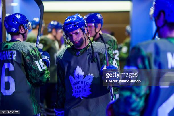 Nazem Kadri of the Toronto Maple Leafs walks out of the dressing room while wearing a camouflage jersey to honour the Canadian Armed Forces before...