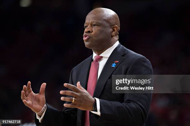 Head Coach Mike Anderson of the Arkansas Razorbacks talks to his team during a game against the Vanderbilt Commodores at Bud Walton Arena on February...