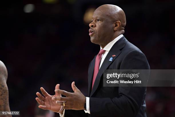 Head Coach Mike Anderson of the Arkansas Razorbacks talks to his team during a game against the Vanderbilt Commodores at Bud Walton Arena on February...