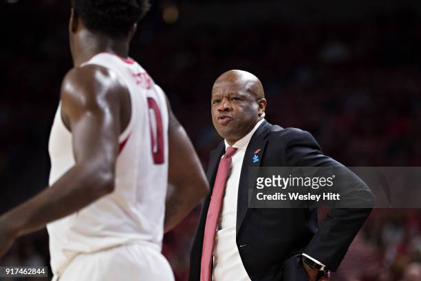 Head Coach Mike Anderson talks with Jaylen Barford of the Arkansas Razorbacks during a timeout against the Vanderbilt Commodores at Bud Walton Arena...