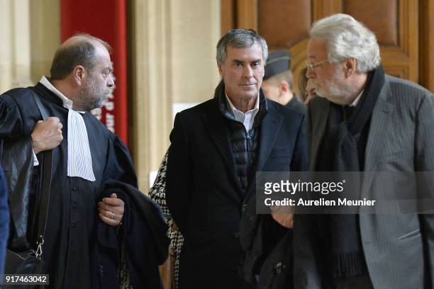 Former French Minister of Economy, Jerome Cahuzac leaves the court house after his appeal trial with his lawyer Eric Dupond-Moretti on February 12,...