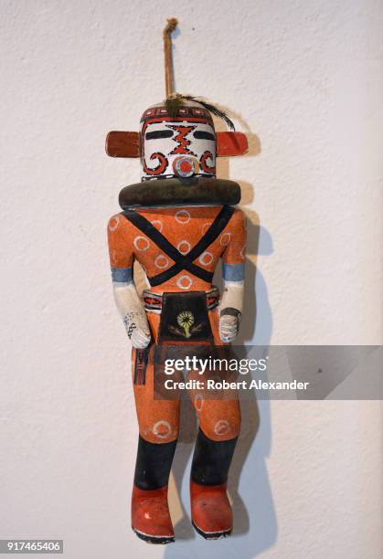 Vintage Native American kachina doll made by a Hopi carver for sale in a Santa Fe, New Mexico, shop.