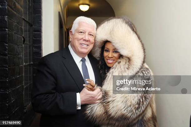 Fashion designer Dennis Basso and stylist, June Ambrose attend the Dennis Basso fashion show at St. Bartholomew's Church on February 12, 2018 in New...