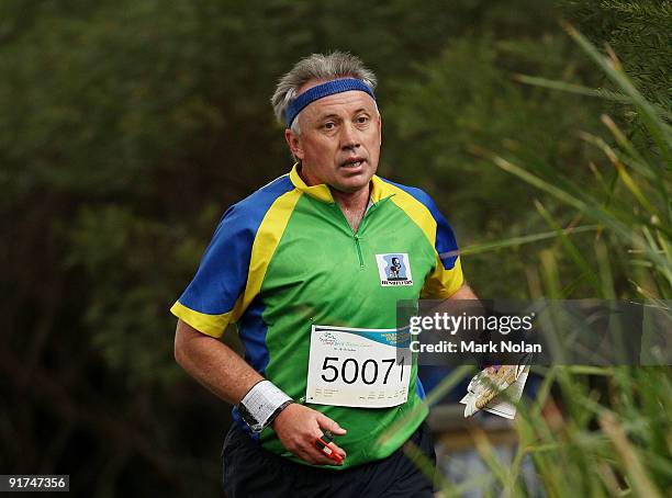 Competitor runs the course during the mens Orienteering during day two of the 2009 Sydney World Masters Games at Sydney Olympic Park on October 11,...