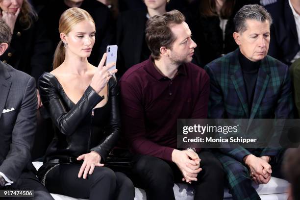 Rosie Huntington Whiteley, Derek Blasberg and Stefano Tonchi attendthe Ralph Lauren fashion show during New York Fashion Week: The Shows on February...