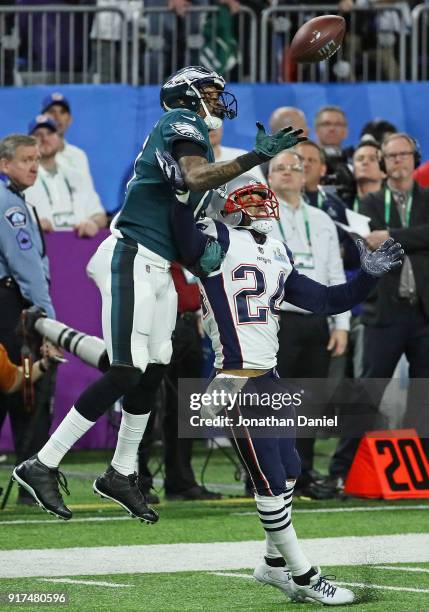 Alshon Jeffery of the Philadelphia Eagles tries to make a catch over Stephon Gilmore of the New England Patriots during Super Bowl Lll at U.S. Bank...