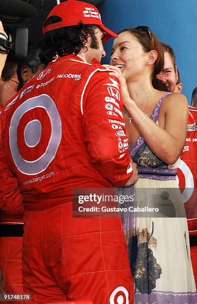 Dario Franchitti, driver of the Target celebrates winning the IndyCar Series Championship with a kiss from his wife the actress Ashley Judd at the...