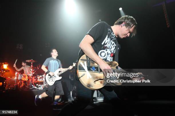 Travis Barker, Mark Hoppus and Tom DeLonge of Blink-182 performs at T-Mobile Sidekick Presents the 2009 Blink-182 Tour at the Hollywood Palladium on...