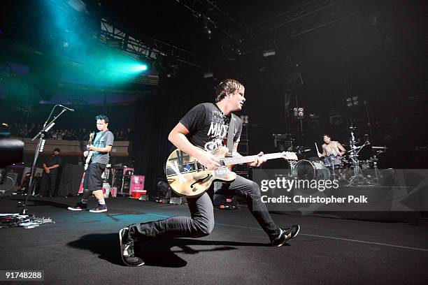 Travis Barker, Mark Hoppus and Tom DeLonge of Blink-182 performs at T-Mobile Sidekick Presents the 2009 Blink-182 Tour at the Hollywood Palladium on...