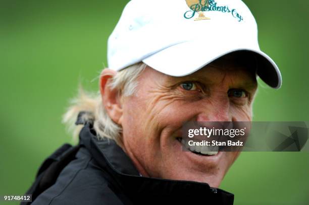 Greg Norman, Captain of the International Team for The Presidents Cup smiles during the day three Morning Foursome Matches of The Presidents Cup at...