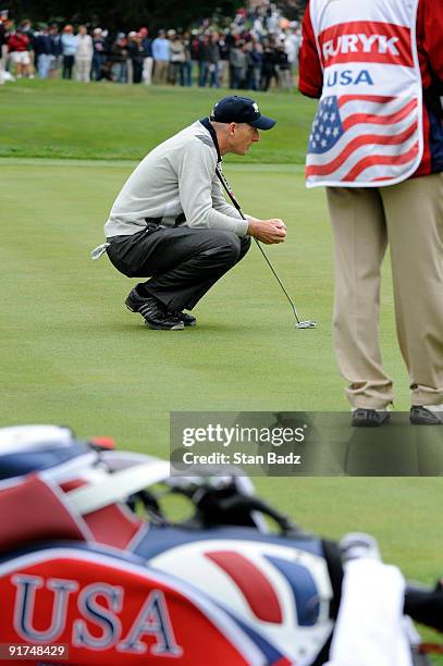 Jim Furyk of the U.S. Team checks his putt at the fifth green during the day three afternoon Fourball Matches of The Presidents Cup at Harding Park...