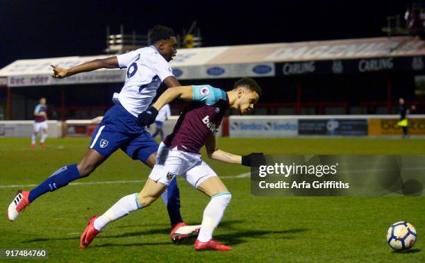 Marcus Browne of West Ham United in action with Jonathan Dinzeyi of Tottenham Hotspur during the Premier League 2 match between West Ham United and...