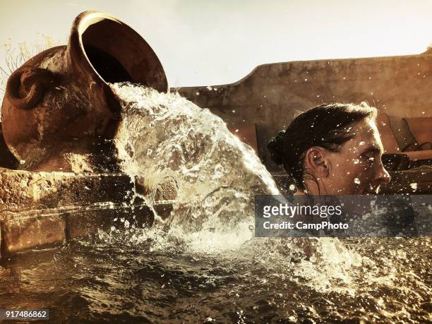 ceramic pot hot spring fountain - calientes stock pictures, royalty-free photos & images