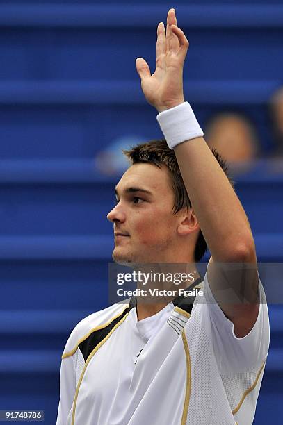 Andreas Beck of Germany acknowledges the crowd after his match against Jose Acasuso of Argentina during day one of the 2009 Shanghai ATP Masters 1000...