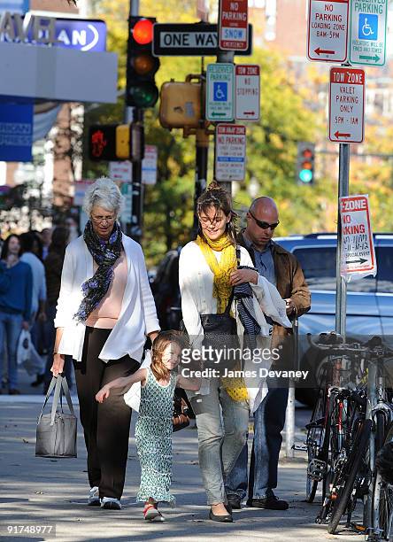 Katie Holmes, daughter Suri Cruise and mother Kathy Holmes walk in Harvard Square on October 10, 2009 in Cambridge, Massachusetts.